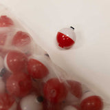 Red and White Plastic Bobber